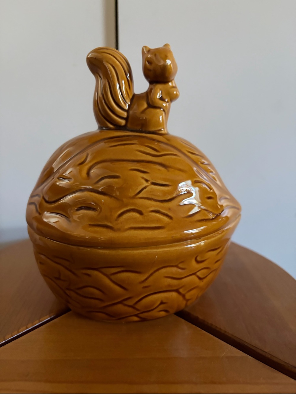 1970s Vintage ceramic walnut-shaped jar featuring a squirrel finial